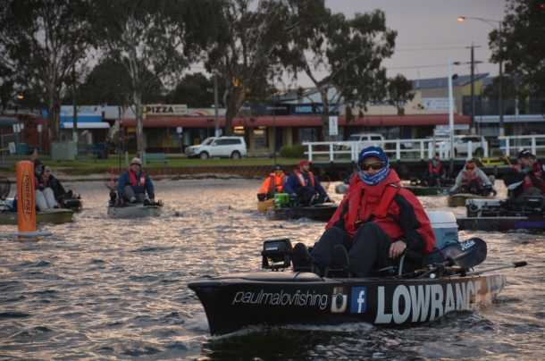 Chris Cleaver with his recently caught and released hybrid cod he likes to call a Murrout (cross between a Murray and trout cod).